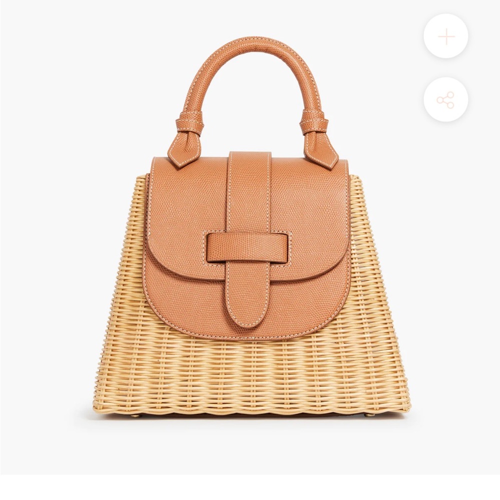 Brand new, never used Pamela Munson Straw and Leather Lady bag.